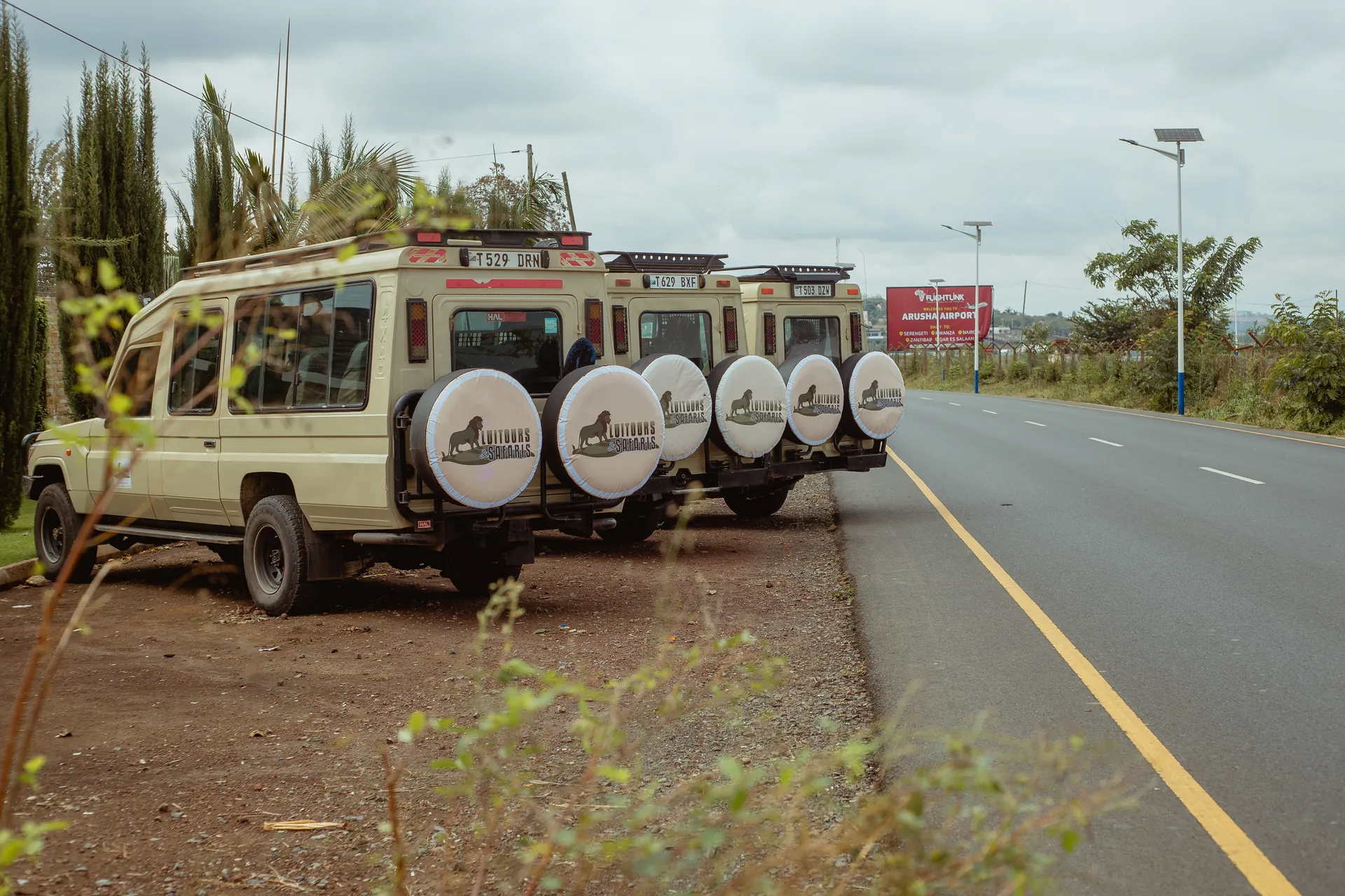 Safari vehicle travelling through a Tanzania wildlife area